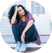 woman sitting on the porch