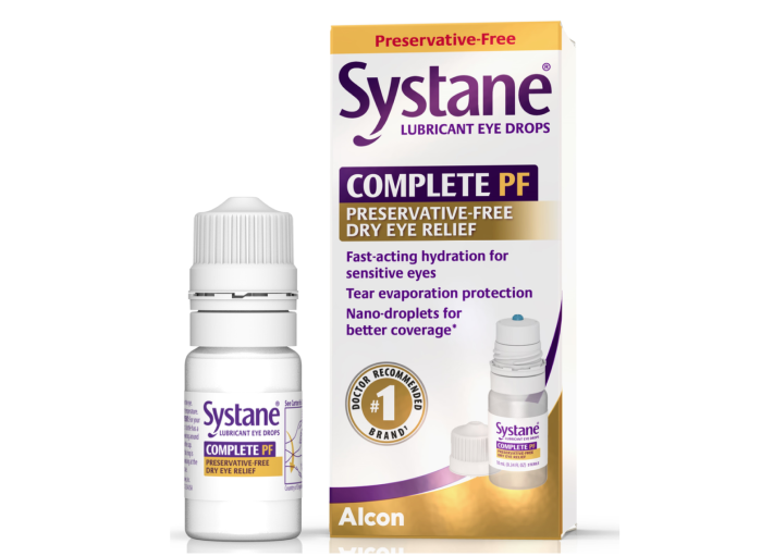 A product image of Systane Complete PF Lubricant Eye Drops. The image features a small white bottle with a screw cap next to its packaging. The packaging highlights that the product is preservative-free and provides complete dry eye relief. The text on the box reads 'Systane Complete PF Lubricant Eye Drops, Preservative-Free Dry Eye Relief,' and mentions benefits like fast-acting hydration, tear evaporation protection, and nano-droplets for better coverage. The Alcon logo is visible at the bottom of the box.