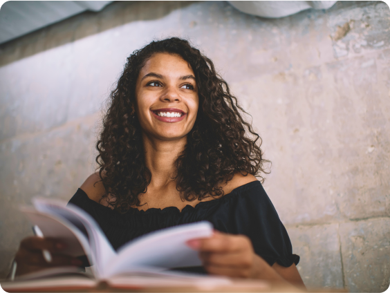A woman reading a book.