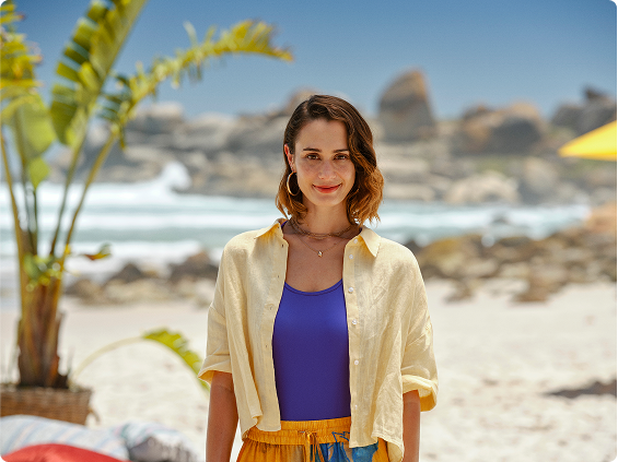 Smiling woman in yellow shirt