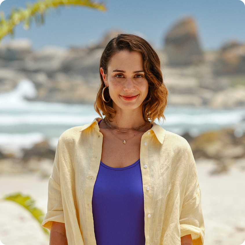 Smiling woman in yellow shirt